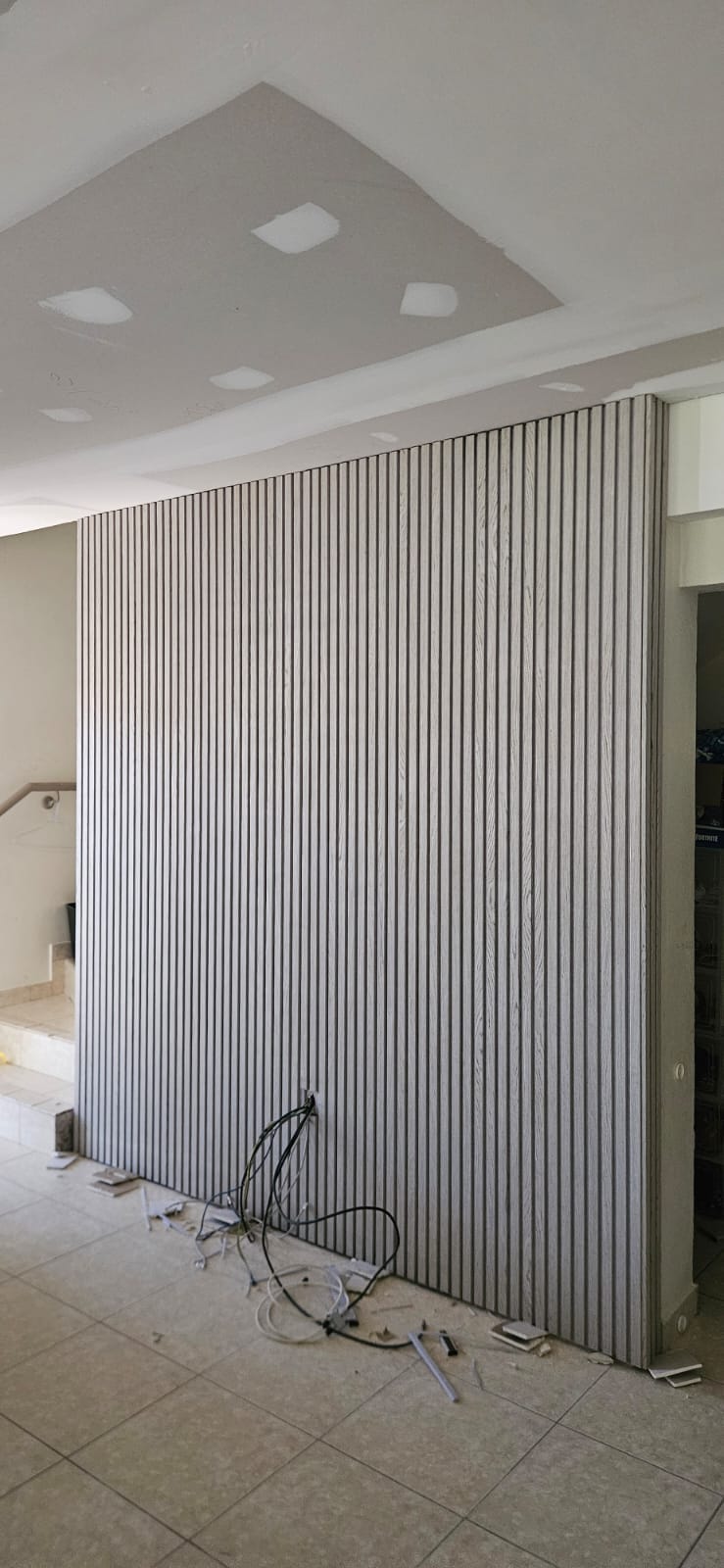 Timber-look feature wall cladding in a modern interior